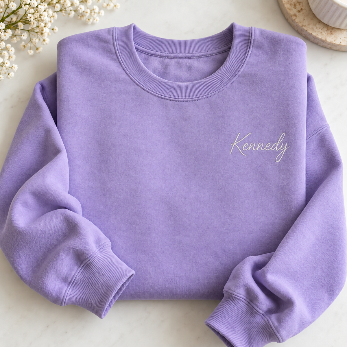 Lavender crewneck with Kennedy name embroidery