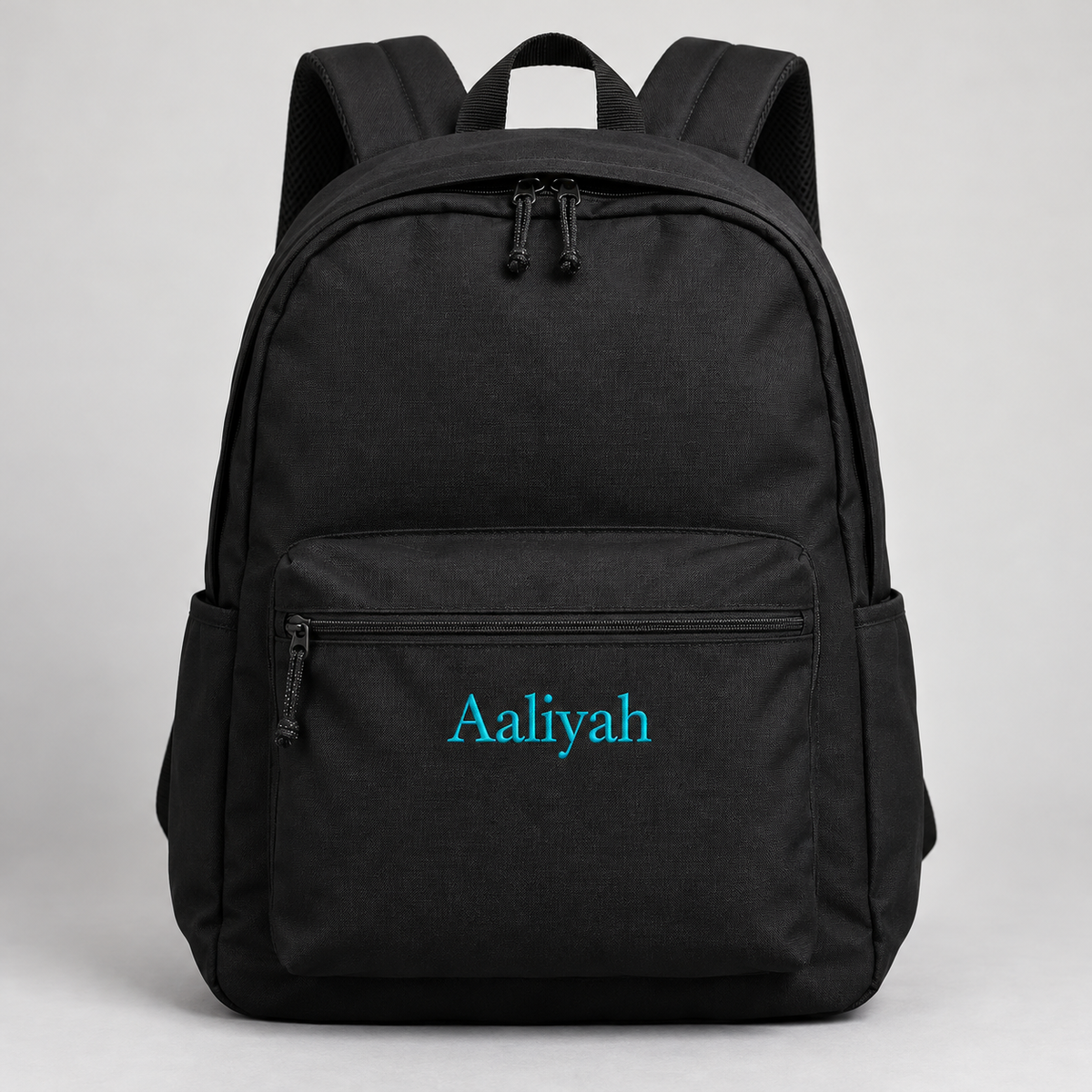 Name embroidered on backpack front